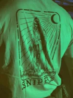 the trace shirt featuring a sniper standing on skulls