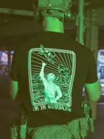 the trace apparel collection featuring a fst jtac guy standing in front of a firing plane