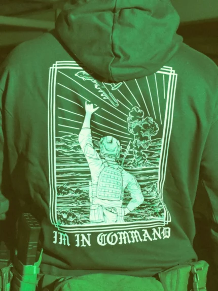 the trace apparel collection featuring a fst jtac guy standing in front of a firing plane