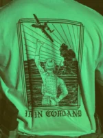 the trace apparel collection featuring a fst jtac guy standing in front of a firing plane