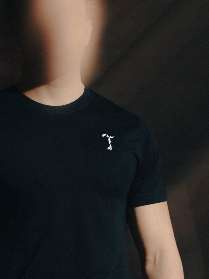 Black T-shirt from The Trace Premium collection with clean, minimalist design