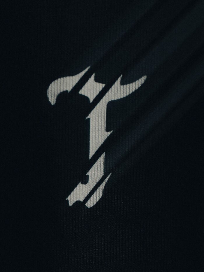 The Trace with bold T logo
