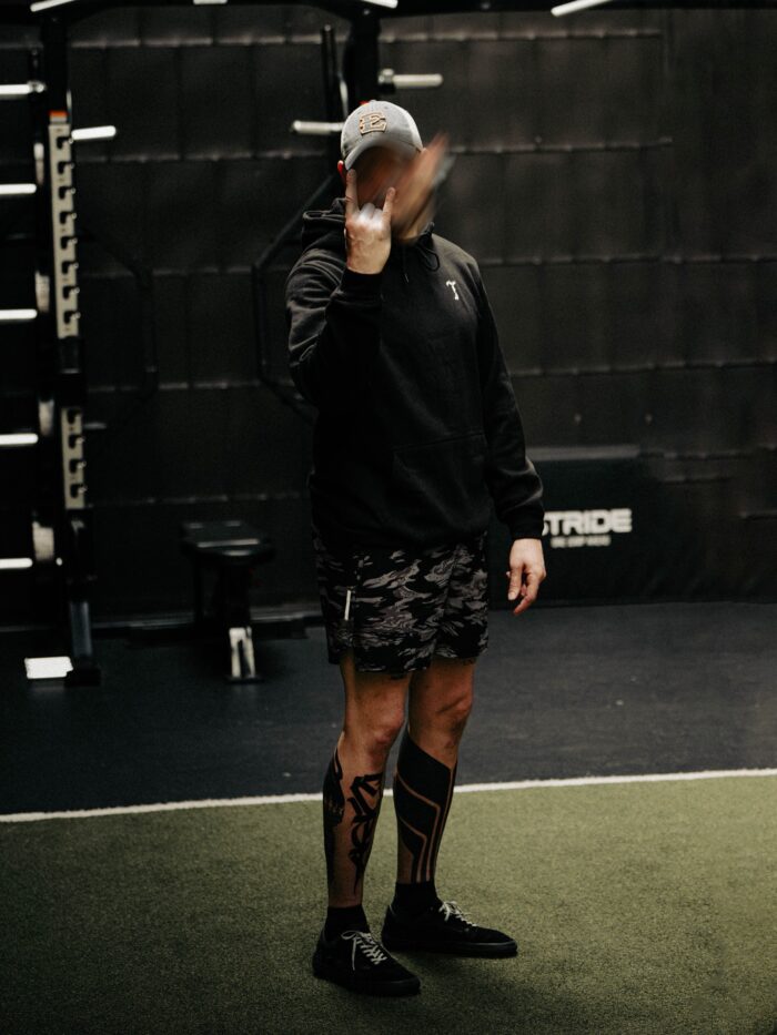 Black hoodie from The Trace featuring Set the Standard design symbolizing the pursuit of the highest performance