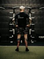 Black T-shirt from The Trace featuring Set the Standard design symbolizing the pursuit of the highest performance