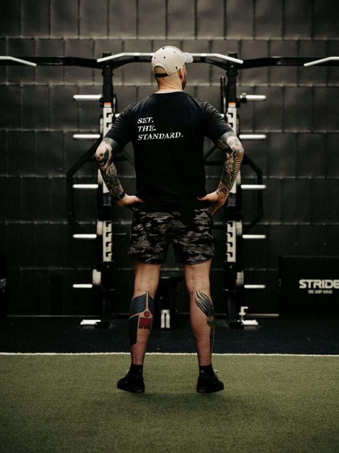 Black T-shirt from The Trace featuring Set the Standard design symbolizing the pursuit of the highest performance