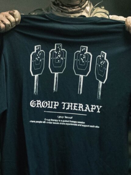 Black hoodie from The Trace featuring Group Therapy design with four targets marked by tight bullet hole groupings