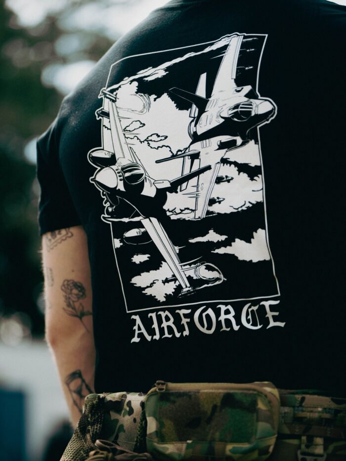 Lightweight t-shirt featuring an F-16 and F-35 in flight, paying tribute to speed, precision, and power