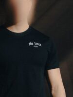 Black T-shirt from The Trace Premium collection with clean, minimalist design