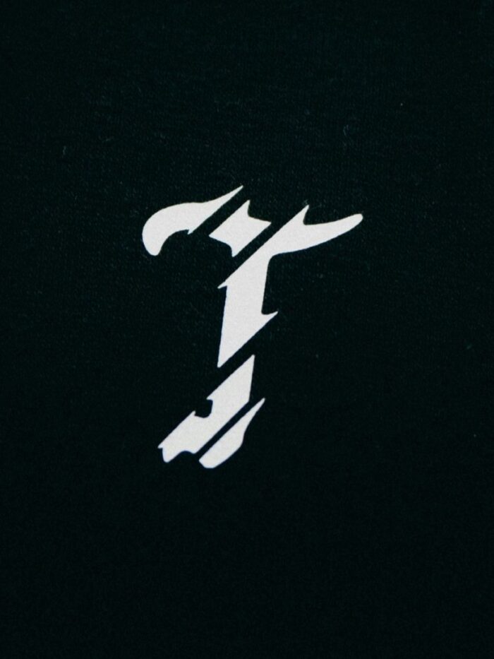 Military-style Trace T-shirt made from durable, high-quality fabric with a comfortable fit; features the signature T logo on the chest, subtle yet bold, symbolising focus, resilience, and tactical intent.