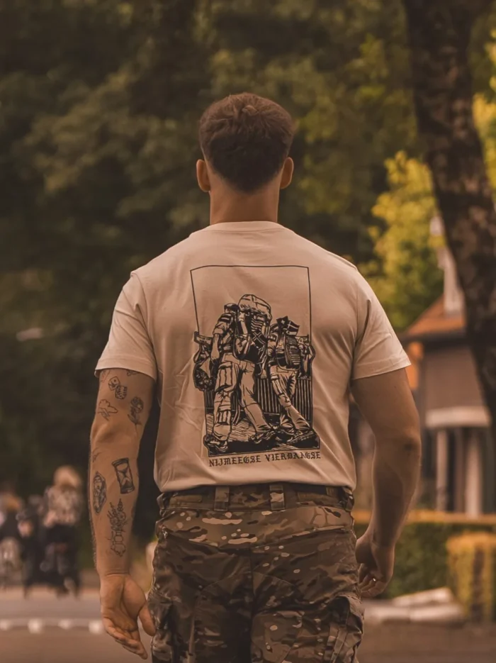 sand T-shirt from The Trace featuring design of two soldiers marching in the Nijmegen Four Days Marches