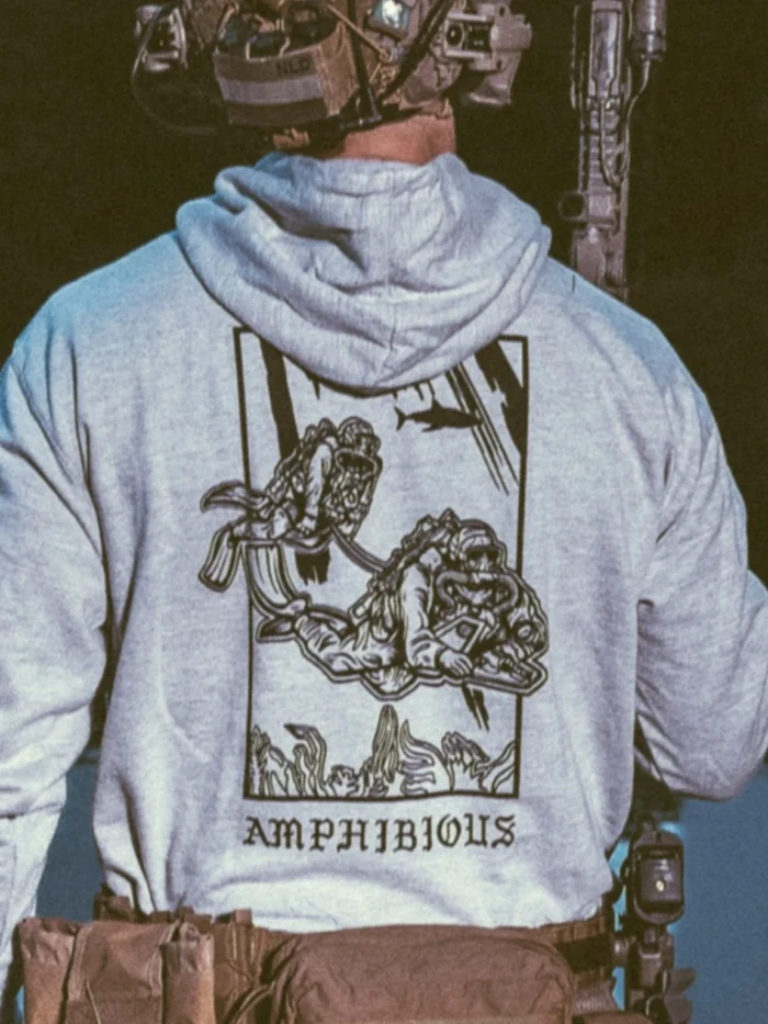 the trace apparel collection featuring two military reconnaissance divers swimming underwater