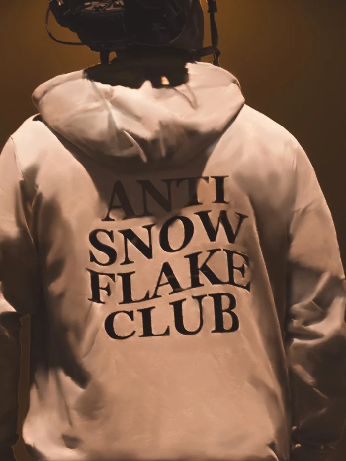 the trace apparel collection featuring a text saying anti snow flake club