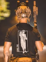 black shirt featuring a girl carrying an anti tank weapon.