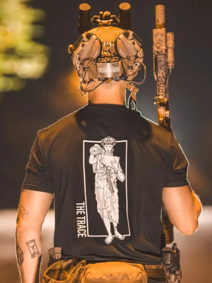 black shirt featuring a girl carrying an anti tank weapon.