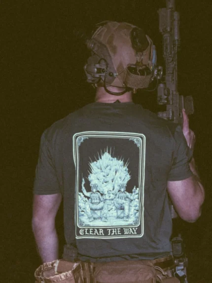 the trace apparel collection with 2 guys sitting in front of a explosing because they are part of the eod