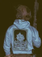 the trace apparel collection with 2 guys sitting in front of a explosing because they are part of the eod