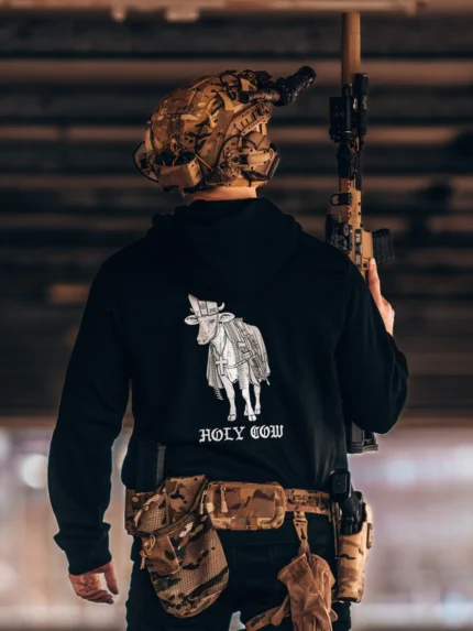 the trace apparel collection featuring a holy cow armed with weapons