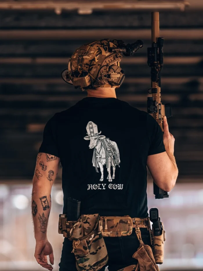 the trace apparel collection featuring a holy cow armed with weapons