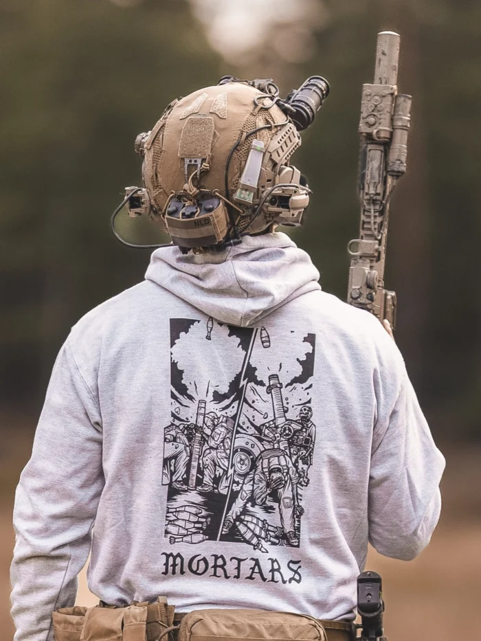 the trace apparel collection featuring guys firing a 81mm mortar and a 120mm mortar