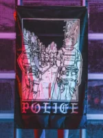 the trace apparel collection featuring two police cops standing in a street watching a riot
