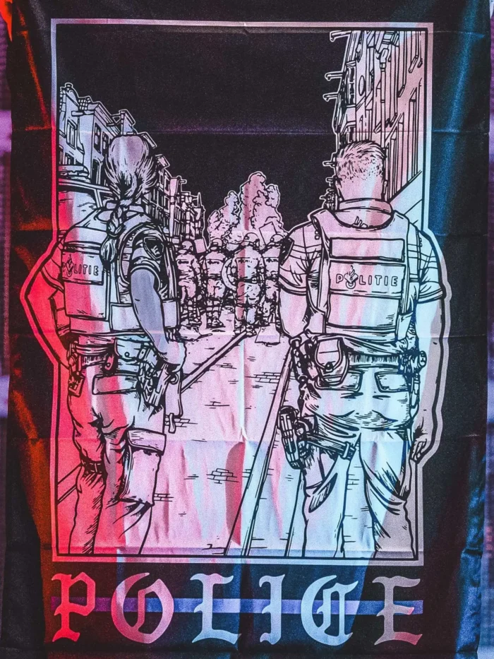 the trace apparel collection featuring two police cops standing in a street watching a riot