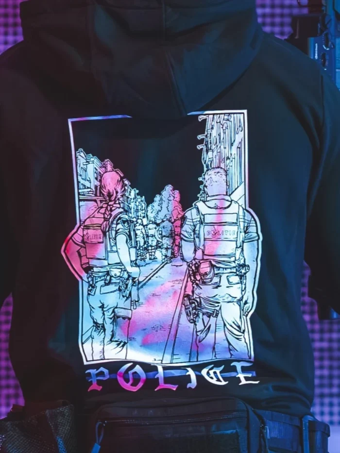 the trace apparel collection featuring two police cops standing in a street watching a riot