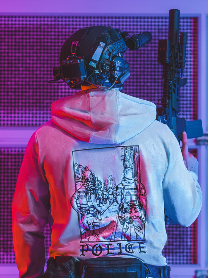 the trace apparel collection featuring two police cops standing in a street watching a riot