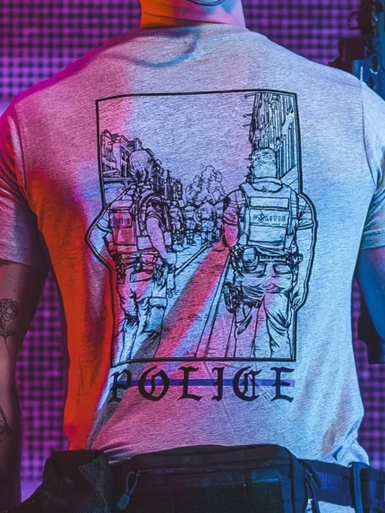 the trace apparel collection featuring two police cops standing in a street watching a riot