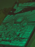 Durable flag printed with Saving Lives imagery of military personnel carrying a wounded comrade as a rescue helicopter hovers above, capturing the essence of sacrifice and unity.