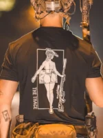 black tshirt from The Trace featuring a girl carrying a sniper weapon.