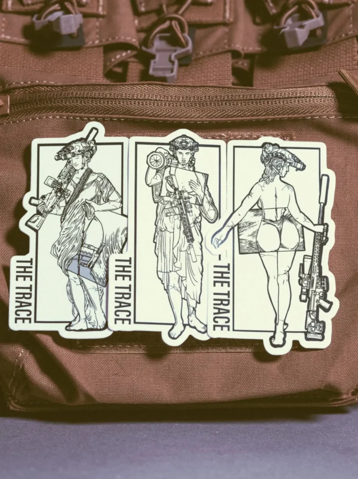 the trace apparel collection stickers featuring a woman holding a anti tank weapon machine gun and sniper