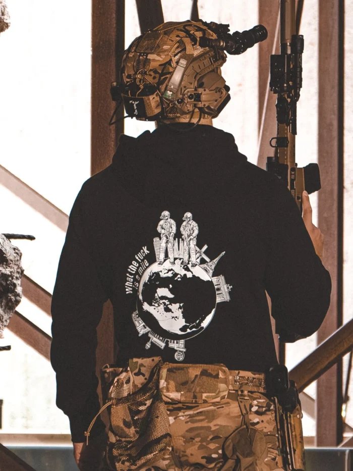 the trace apparel collection featuring 2 operators standing on europe and watching america saying wtf is a mile