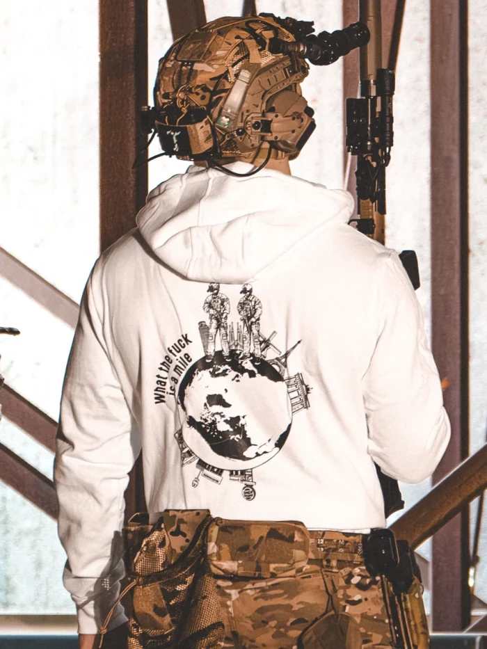 the trace apparel collection featuring 2 operators standing on europe and watching america saying wtf is a mile