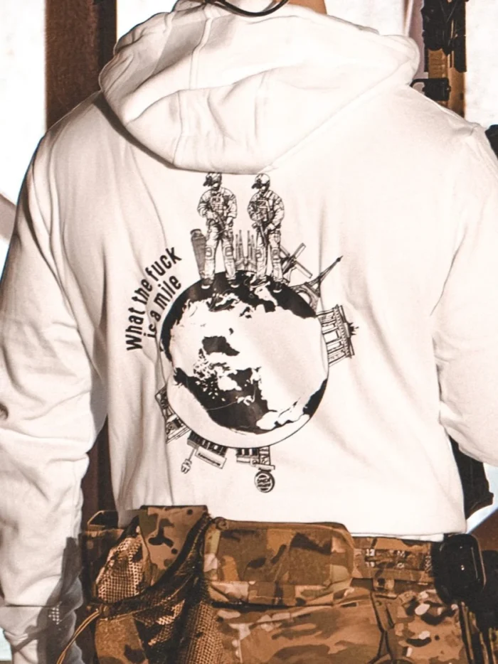 the trace apparel collection featuring 2 operators standing on europe and watching america saying wtf is a mile