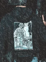 the trace apparel collection featuring a design with a military operator standing next to a snowman with a text saying anti snow flake club