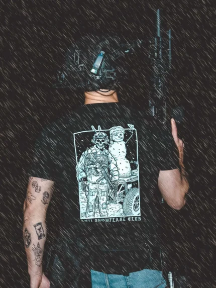 the trace apparel collection featuring a design with a military operator standing next to a snowman with a text saying anti snow flake club