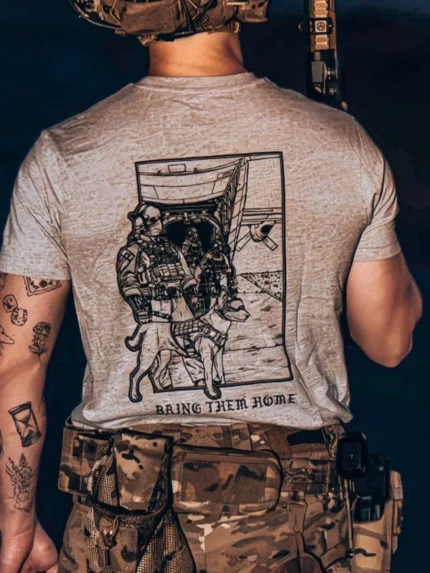 grey tshirt from The Trace featuring k9 and his doghandler on a rescue mission by c130.