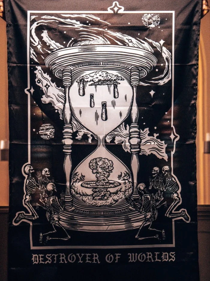 the trace apparel collection featuring skeletons praying to an hourglass showing atomic weapons dropping