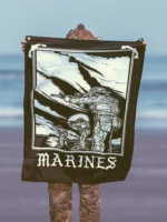 the trace apparel collection featuring marines standing partly in the water