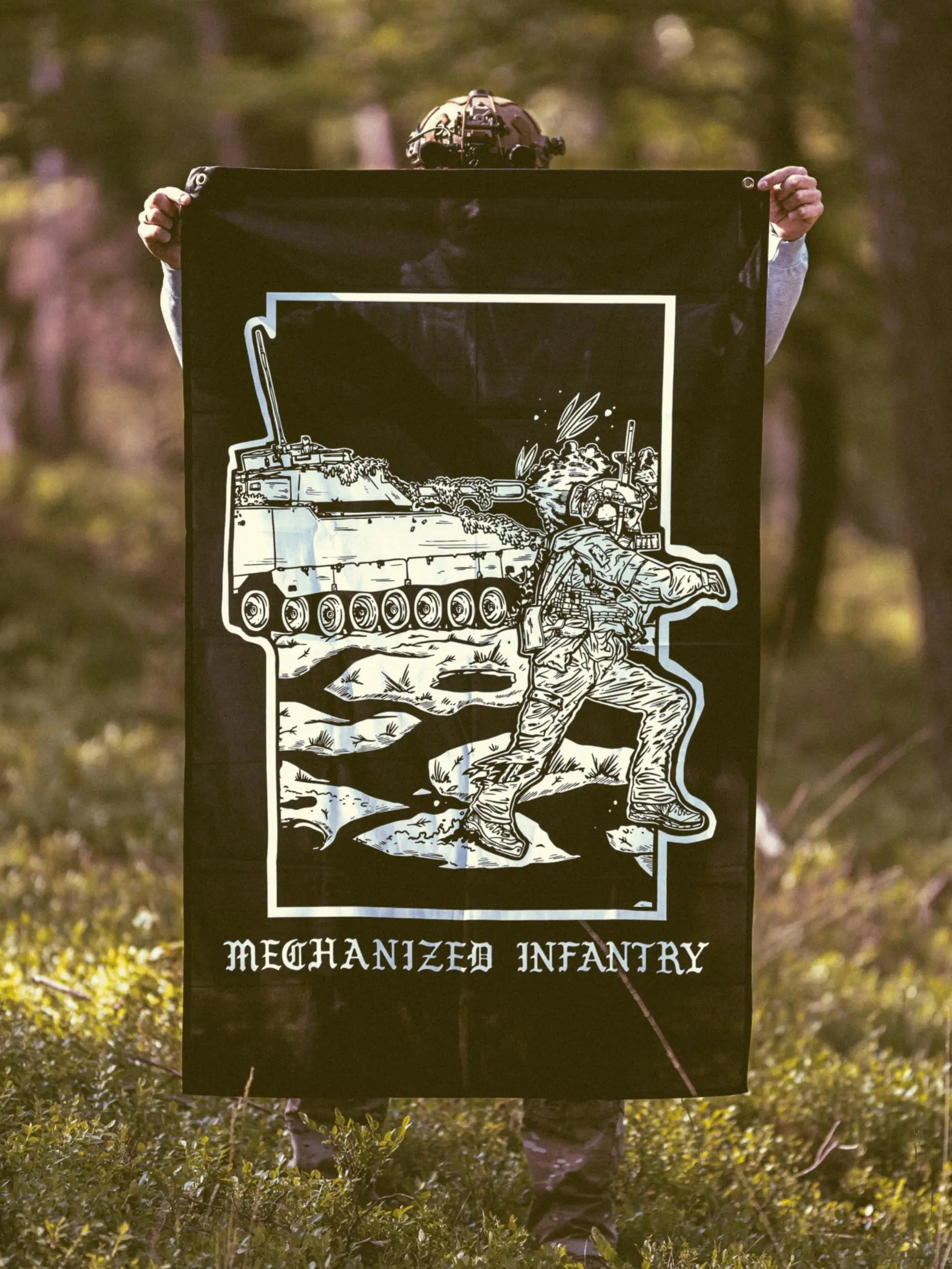 the trace apparel collection featuring guys fighting alongside a military cv90 vehicle