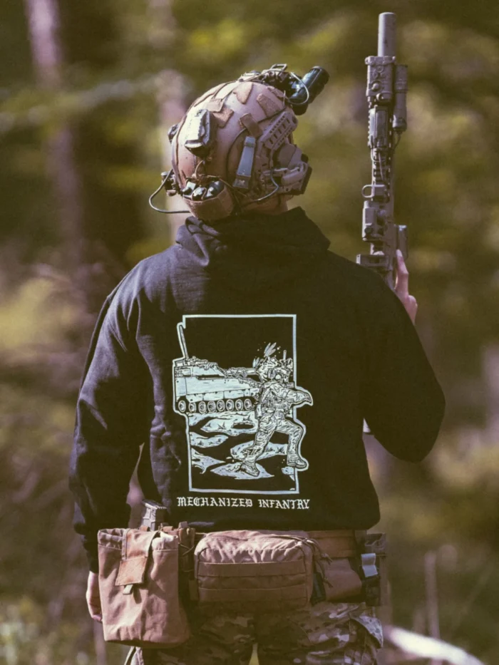 the trace apparel collection featuring guys fighting alongside a military cv90 vehicle