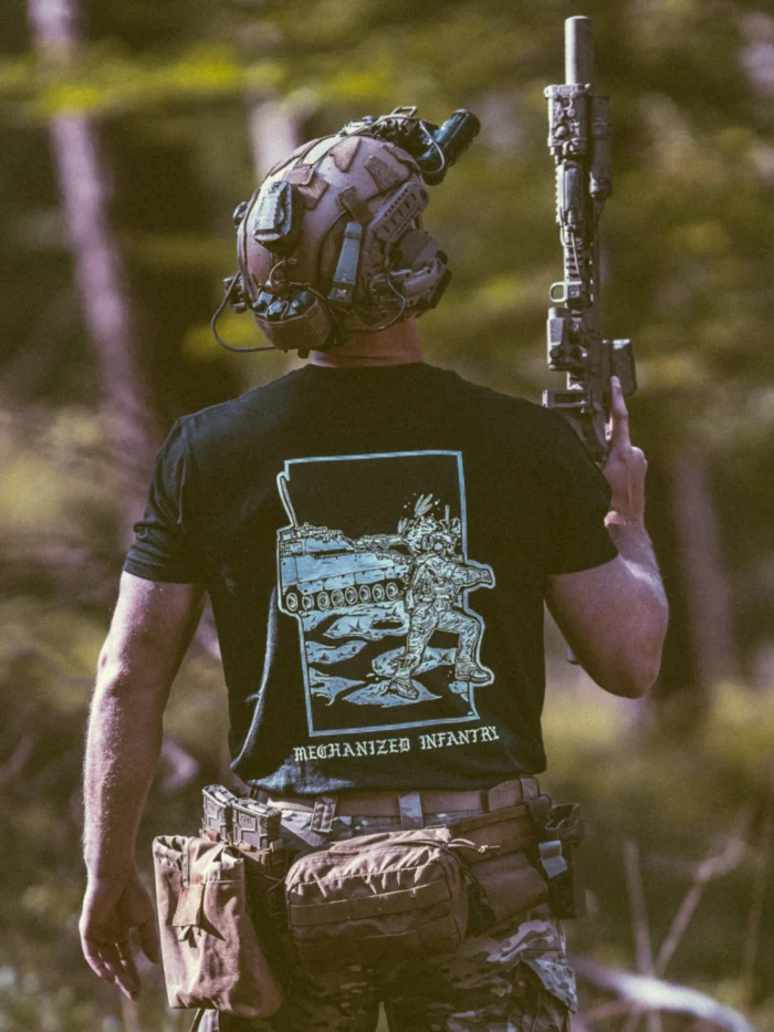 the trace apparel collection featuring guys fighting alongside a military cv90 vehicle