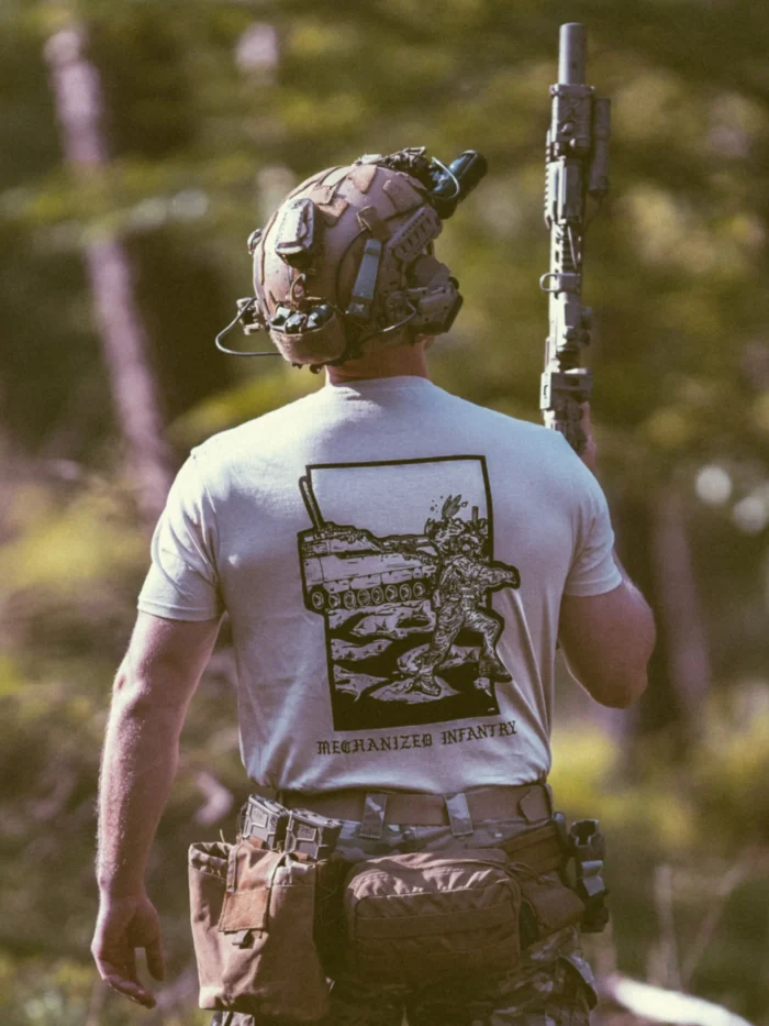 the trace apparel collection featuring guys fighting alongside a military cv90 vehicle
