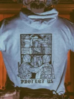the trace apparel collection featuring a military and a police guy standing in front of a tinted window that displays saint michael the protector