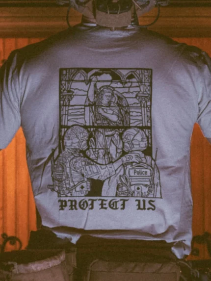 the trace apparel collection featuring a military and a police guy standing in front of a tinted window that displays saint michael the protector