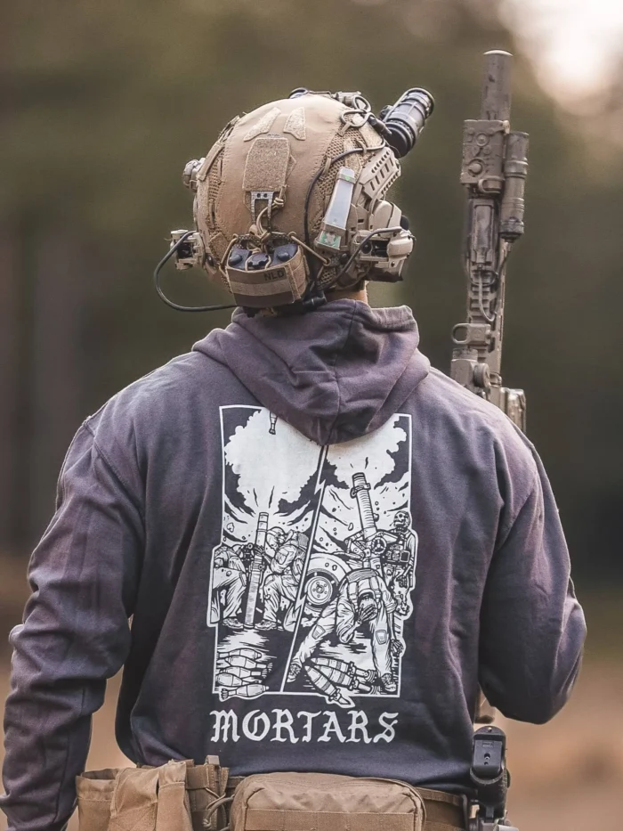 the trace apparel collection featuring guys firing a 81mm mortar and a 120mm mortar