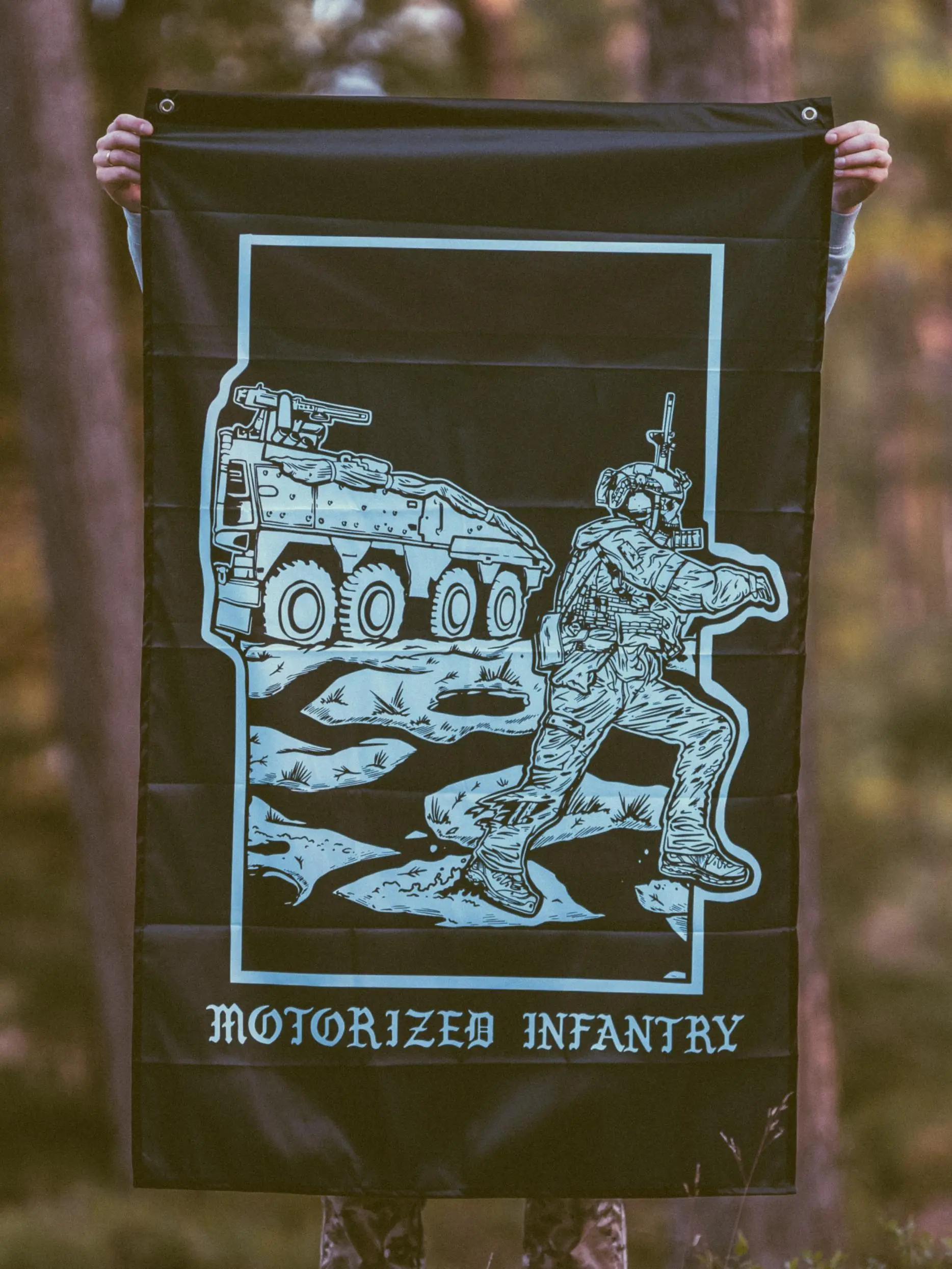 the trace apparel collection featuring guys fighting alongside a military boxer vehicle