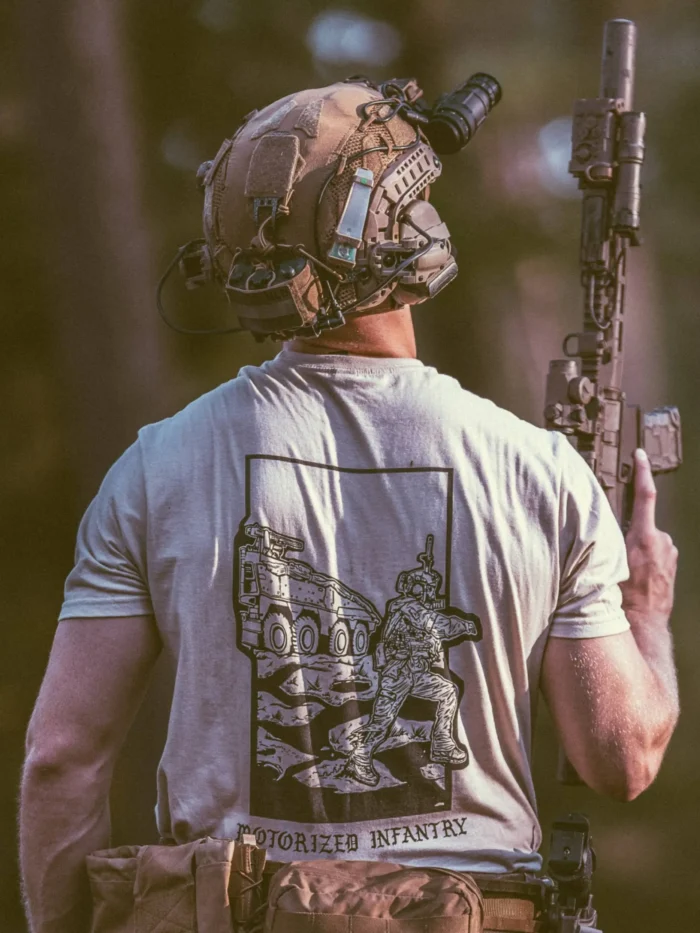 the trace apparel collection featuring guys fighting alongside a military boxer vehicle