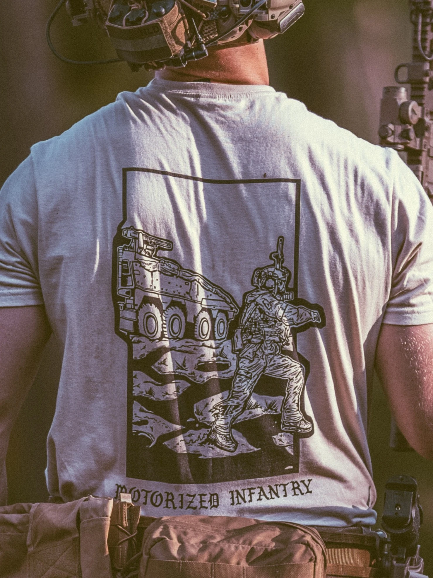 the trace apparel collection featuring guys fighting alongside a military boxer vehicle