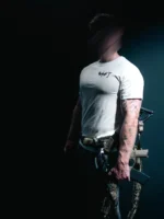 the trace mockup clothing featuring their T logo on the chest and a weapon on the hand